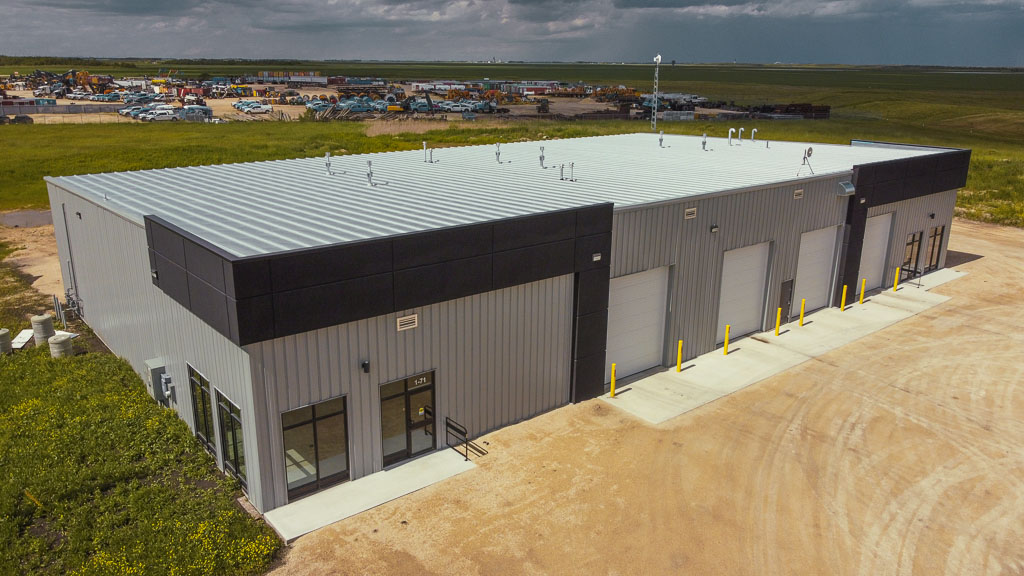 U-Build Your rigid frame steel building can be designed with space for all aspects of your business. This septic and plumbing services building is designed with service bays, storage space, and office space.