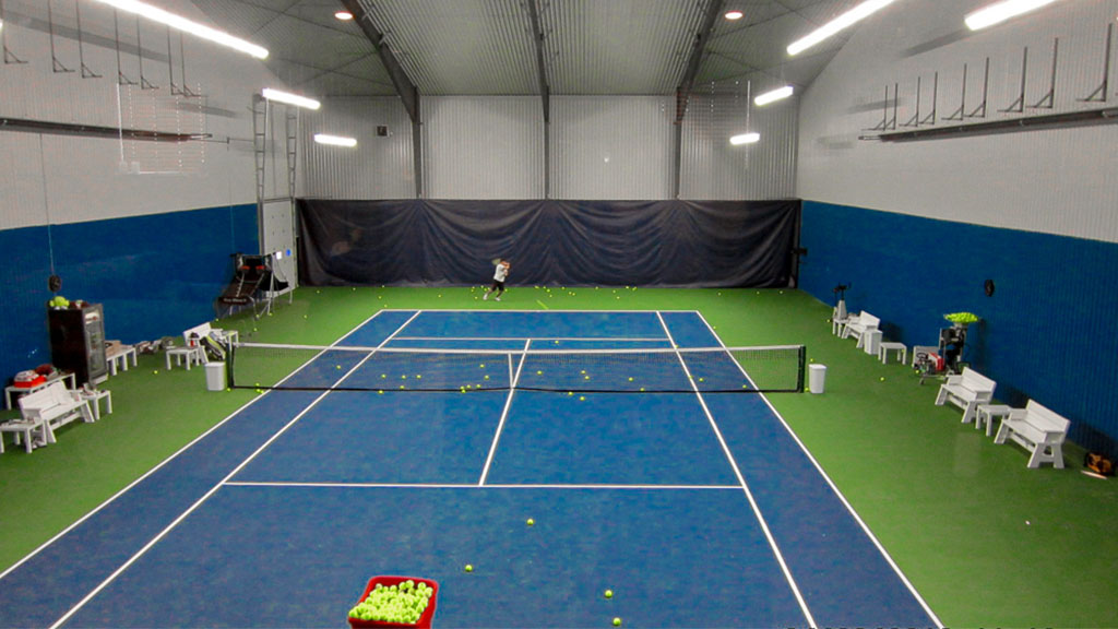 U-Build The flexibility is endless with a steel pre-engineered recreational center. This building hosts multiple indoor recreational spaces such as this tennis court.