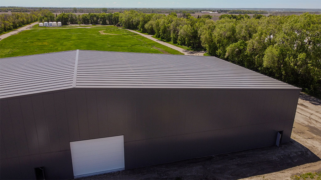 U-Build This large Rigid Frame building hosts two bays for potato and sweet potato storage, along with workspace for sorting and shipping.